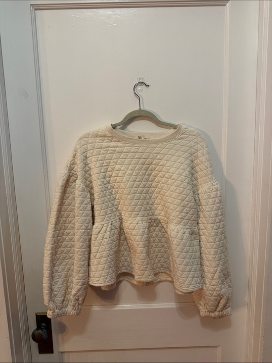 New in Sweaters - Cream Quilted Peplum Sweatshirt - Women